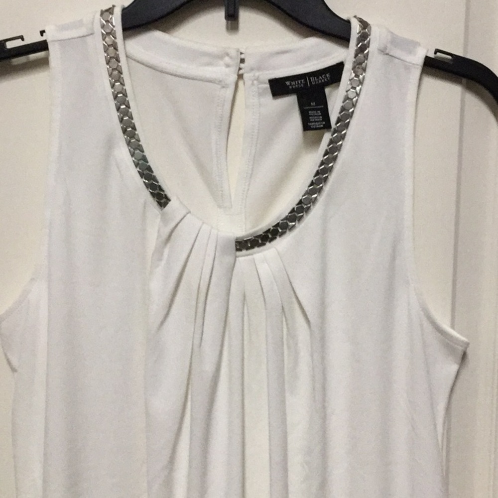 Brand new sleeveless tunic